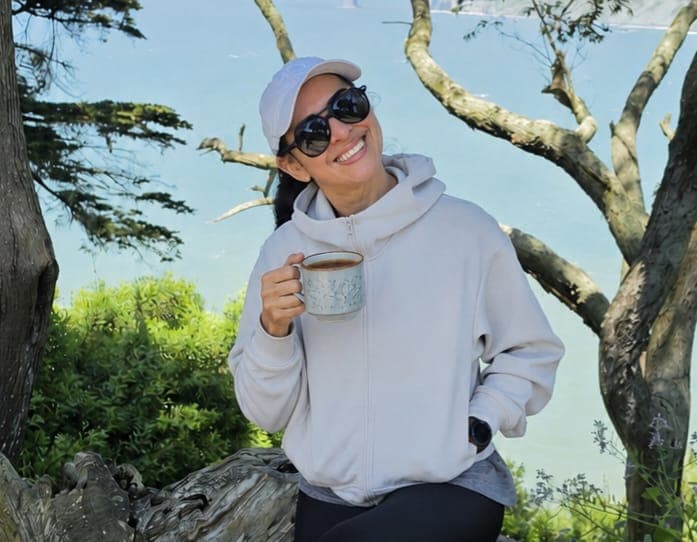 The founder of Tea Shots Club enjoying a cup of tea